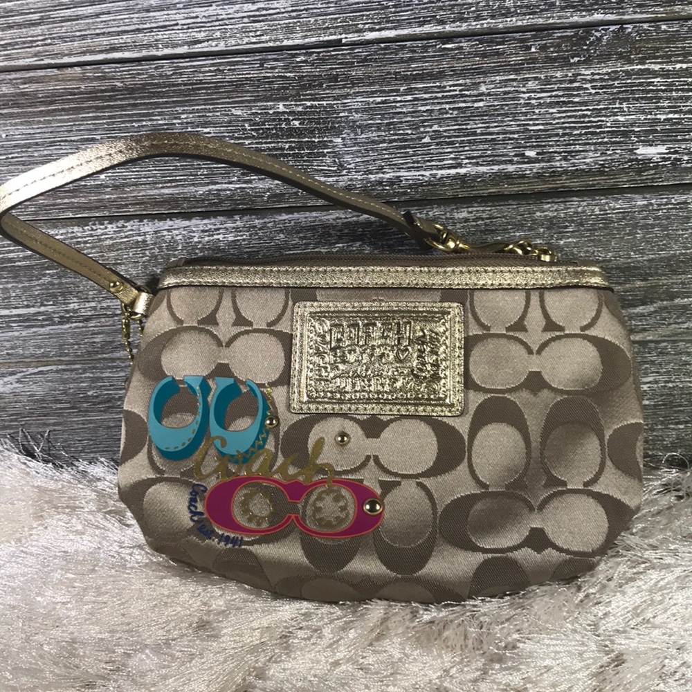 Authentic Coach signature wristlet